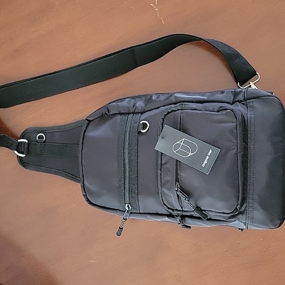 NWT, Black cross-body backpack, unisex, one size